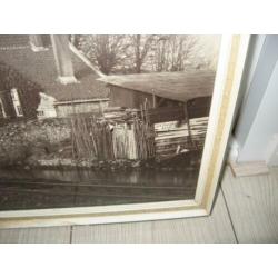 Schilderij/foto van een molen, gesigneerd. 45x63 cm.€25.00