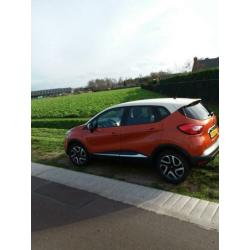 Renault Captur 0.9 TCE 90 2013 kleur Oranje/Wit