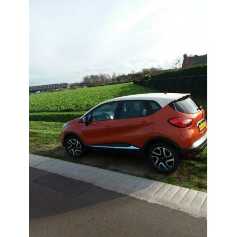 Renault Captur 0.9 TCE 90 2013 kleur Oranje/Wit