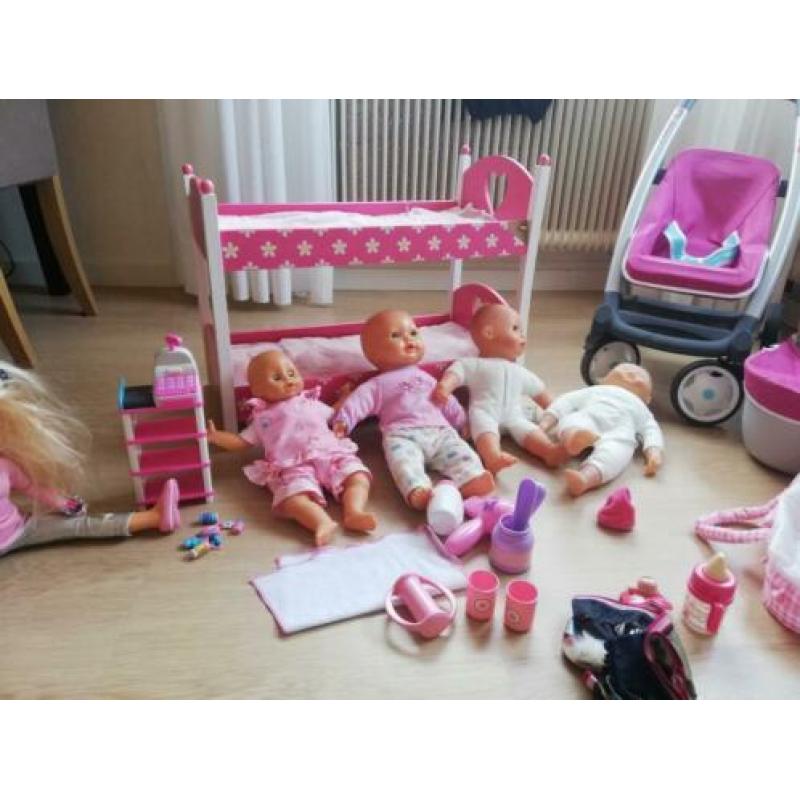 Baby Born pop. Quinny kinderwagen. Slaapzak. Reiswiegje.