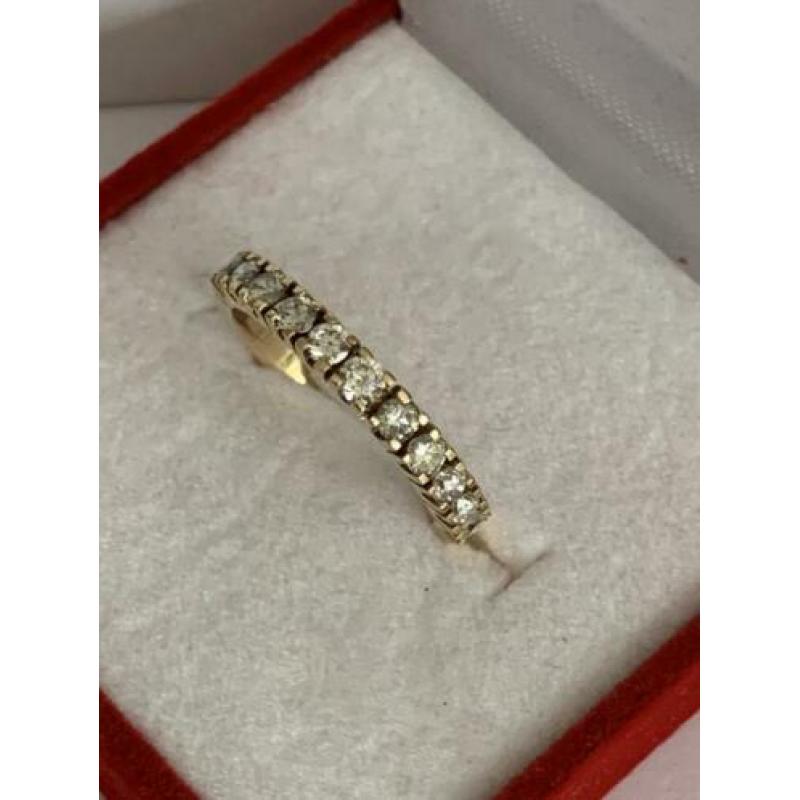 18 krt.geel gouden rijring met 11 diamanten totaal 0,56 ct