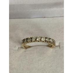 18 krt.geel gouden rijring met 11 diamanten totaal 0,56 ct