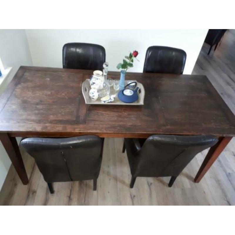 Elegante eettafel, koloniale kleur, met 8 donkerbruine leren
