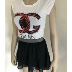 Shirt wit valt als XS rok bij mij adv