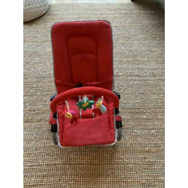Rode wipper met speeltjes te koop