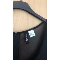 Zwarte korte dames playsuit maat 42-L H&M