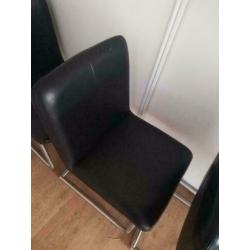 4 leren eetkamerstoelen