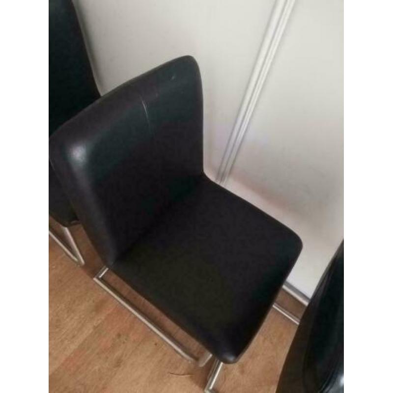 4 leren eetkamerstoelen