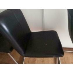 4 leren eetkamerstoelen