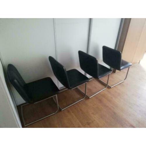 4 leren eetkamerstoelen