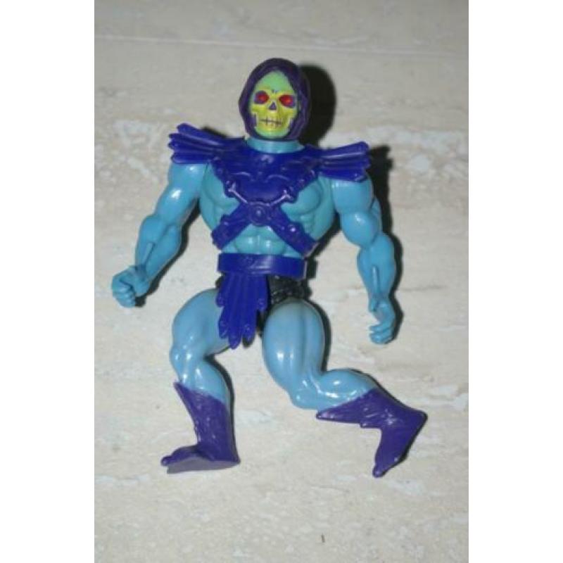 Diverse He-Man figuren en onderdelen.