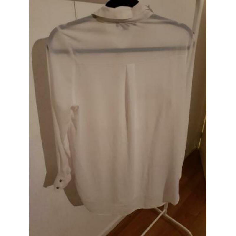 Witte doorzichtige blouse