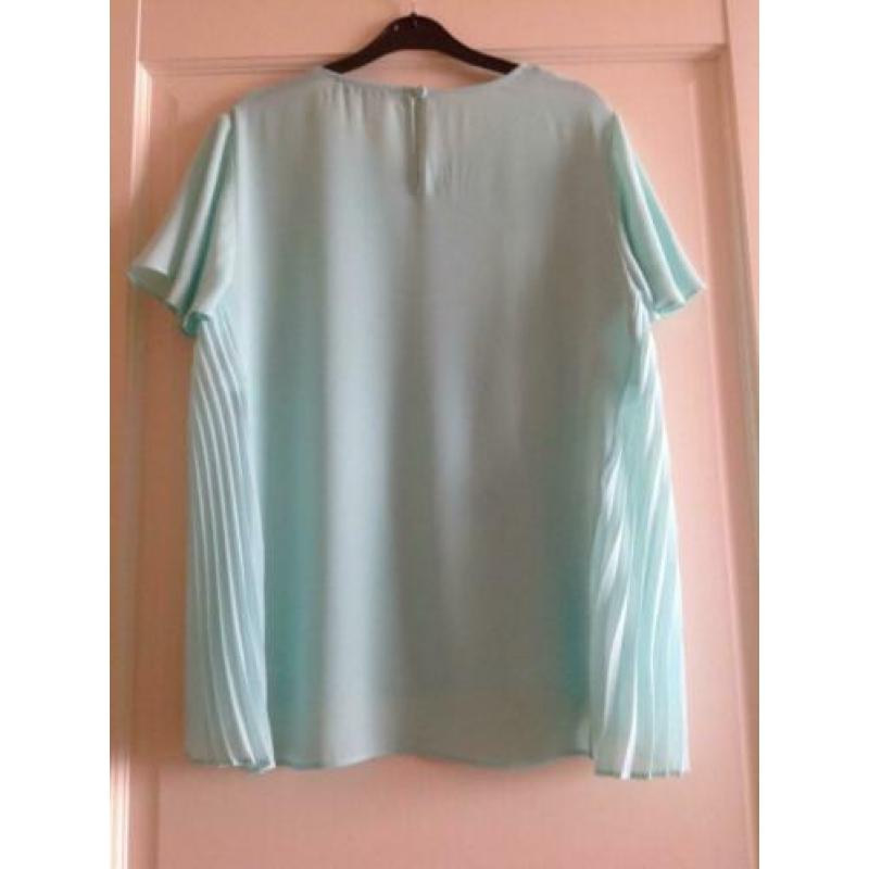 Leuke mintgroen blouse te koop. Maat 40. Top