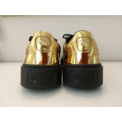 Goud kleurige Puma sneakers