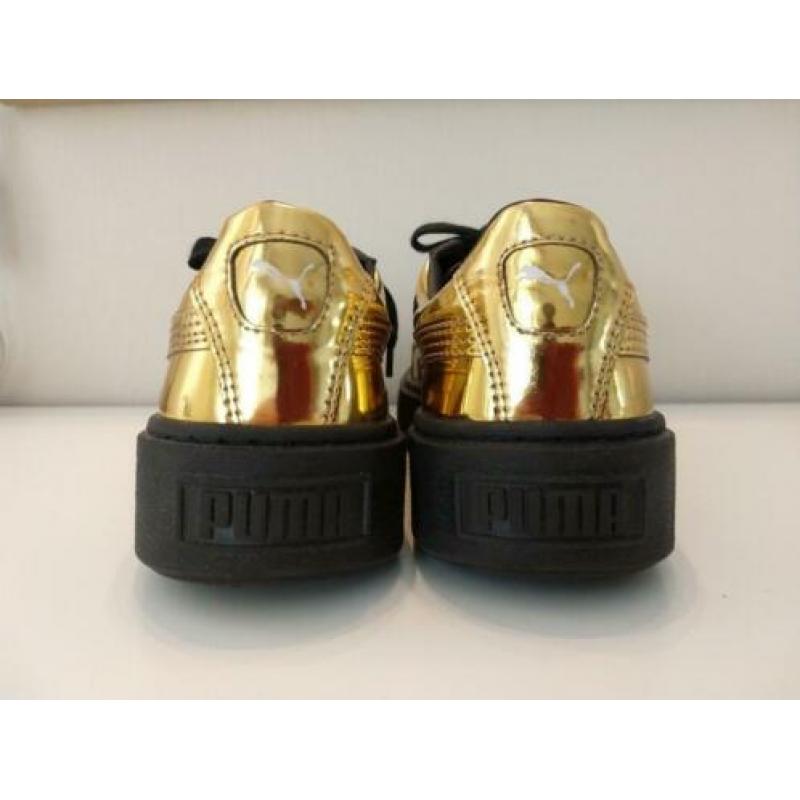 Goud kleurige Puma sneakers