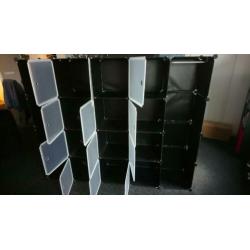 Modulaire kast met 14 compartimenten zwart en wit