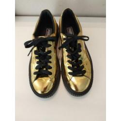 Goud kleurige Puma sneakers