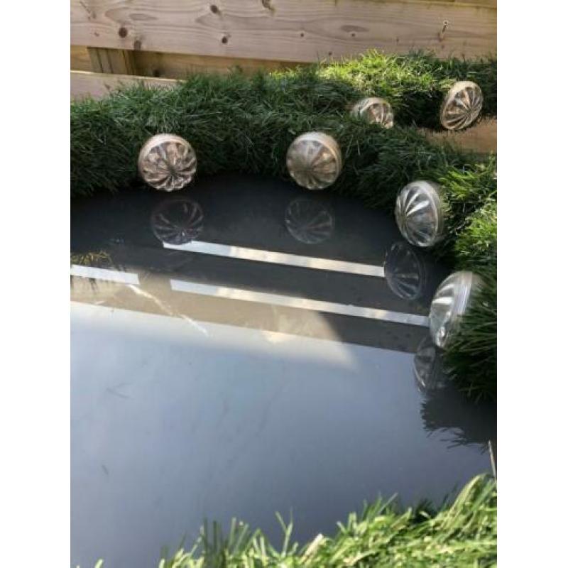 2 grote sierbogen met lampjes