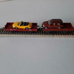 Marklin autotransport wagon met een Porsche en een Mercedes