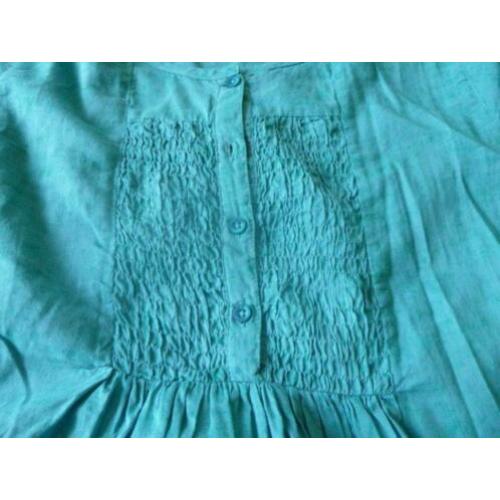 Groene tuniek, lange mouw, maat 158.