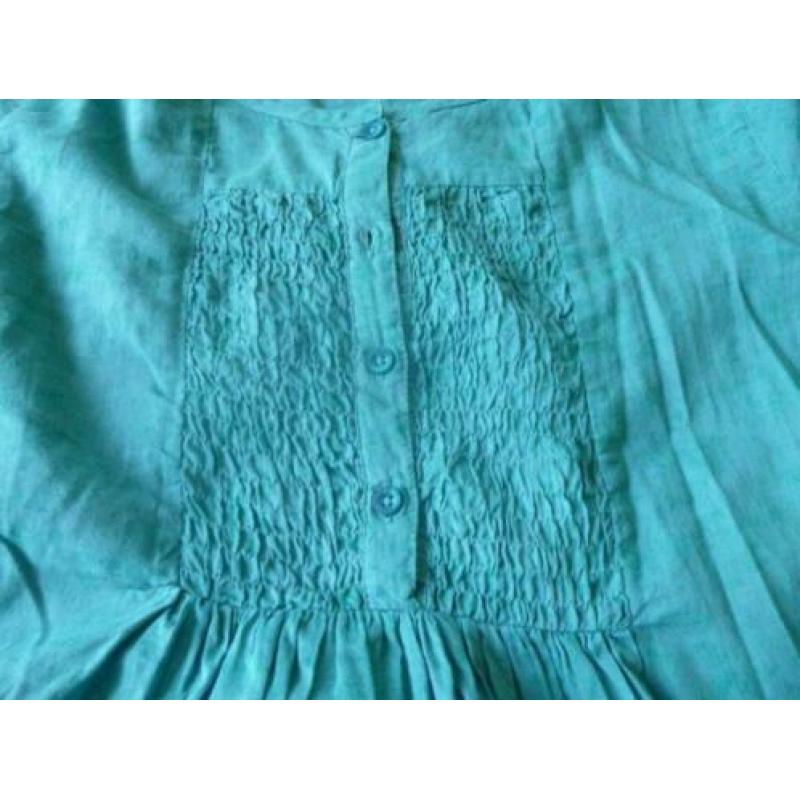 Groene tuniek, lange mouw, maat 158.