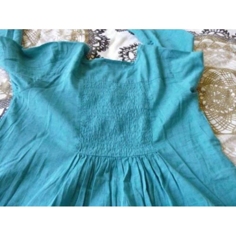 Groene tuniek, lange mouw, maat 158.