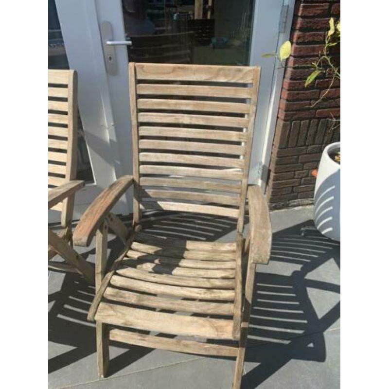 Twee teak inklapbare stoelen goede staat drie standen