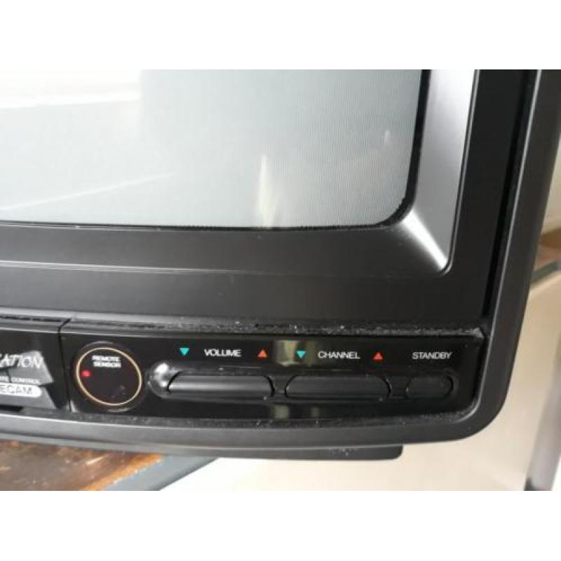 Te koop. Silver portable kleuren TV