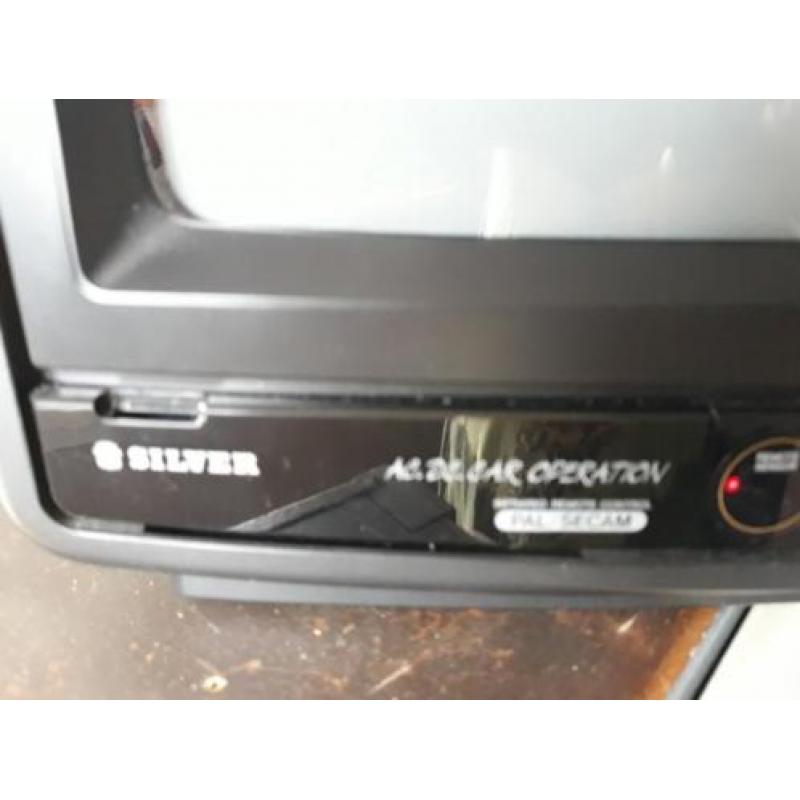 Te koop. Silver portable kleuren TV