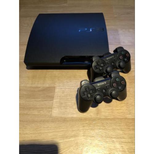 Playstation 3 met 14 games, 2 controllers en docking station
